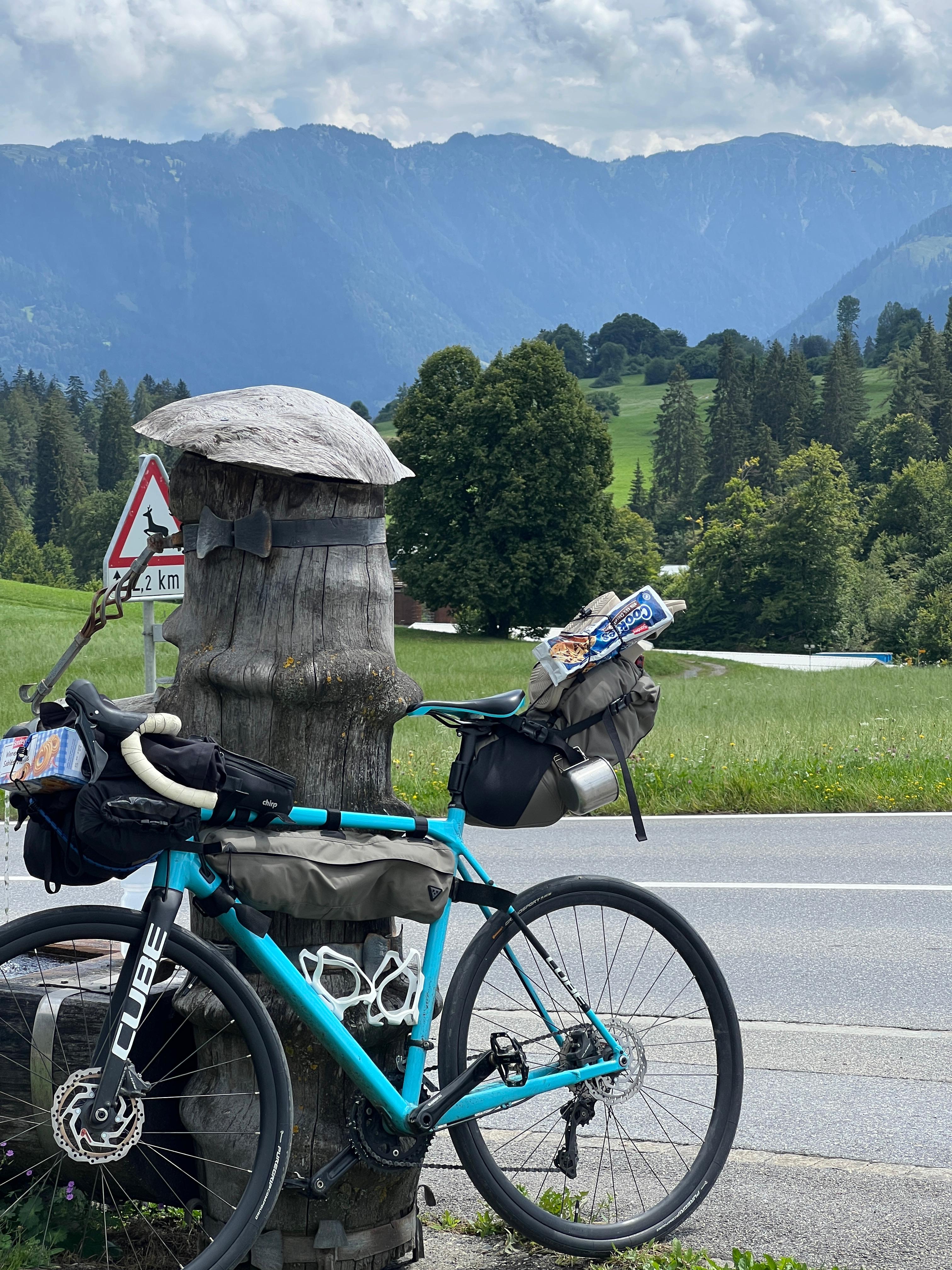 Packed road bike in the Alps